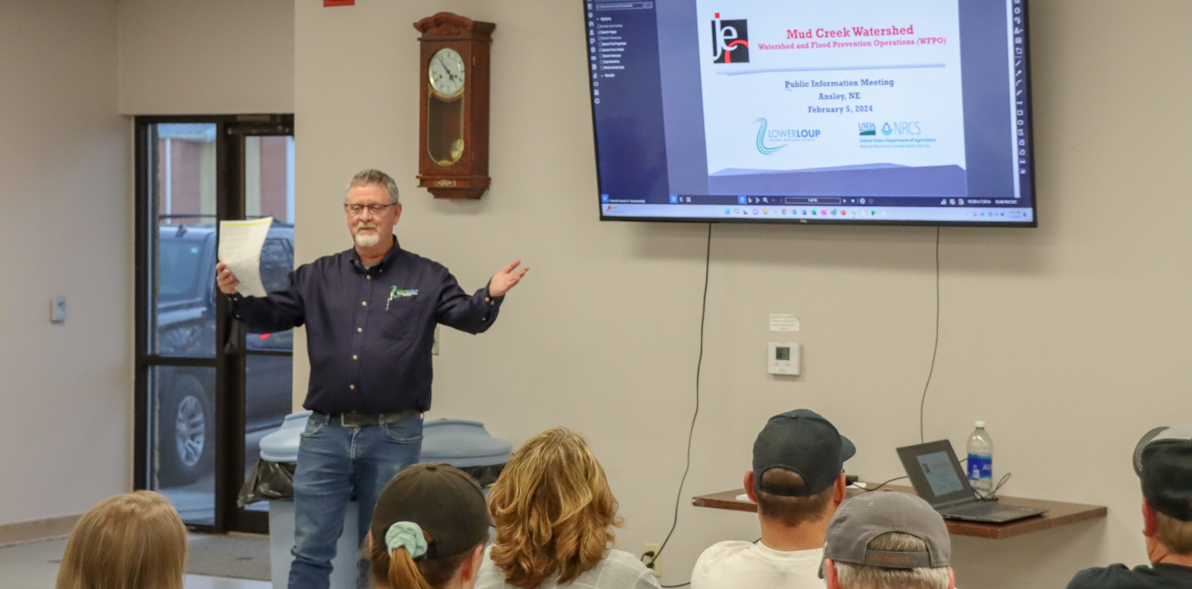 Kevin Gustafson addressing a public meeting