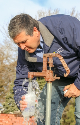 Harold Benton Checking a domestic well
