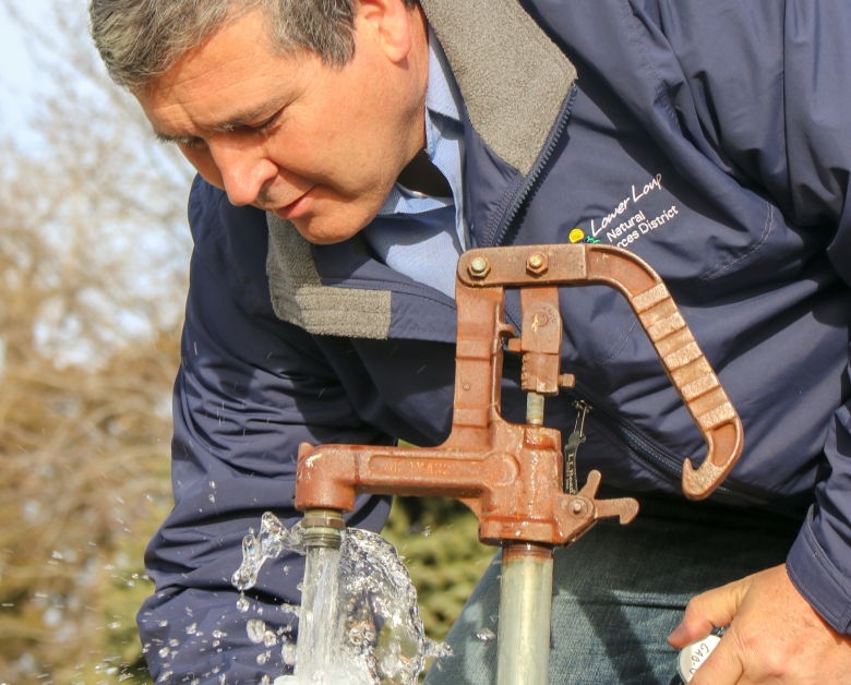 Harold Benton Checking a domestic well